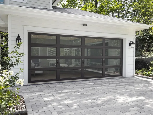 Port St. Lucie Garage Door Repair design specialist presenting custom garage door options to Port St. Lucie homeowner